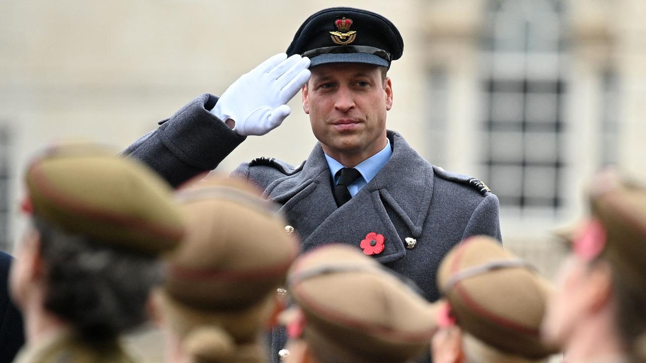 Prince William, Duke of Cambridge salutes veterans marching past on Horse Guards Parade during the Remembrance Sunday ceremony in central London. Picture: Daniel Leal / AFP