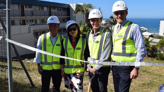 Turning the first sod at the Aqua View Apartments site in Kings Beach are (from left) husband-and-wife developers Alex Yuan and Stella Sun with construction company Tomkins direector Mike Tomkins and Councillor Tim Dwyer.