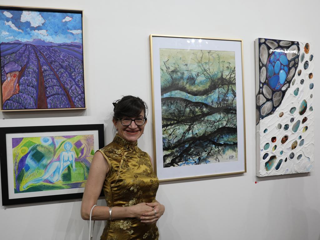 Karyn Payne with her work