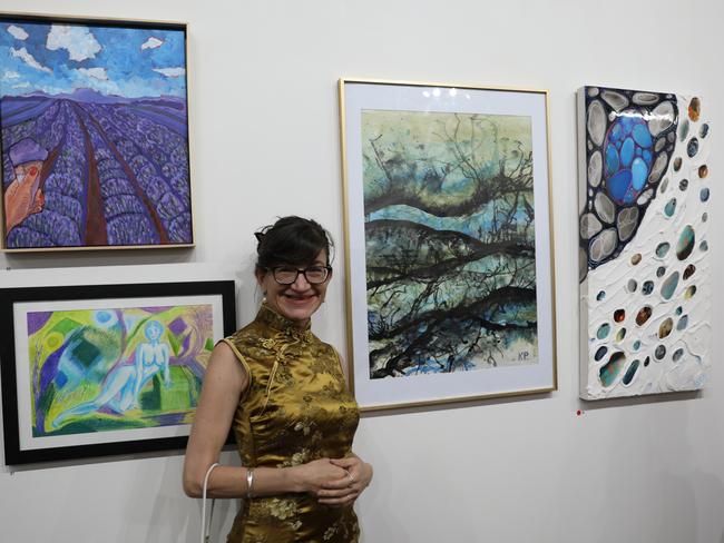 Karyn Payne with her work