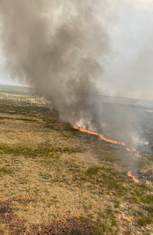 A wildfire in the Barkly region has burnt more than 9300sq km, calling for interstate water bombers to help fight the “uncontrolled” blaze. Picture: Bushfires NT