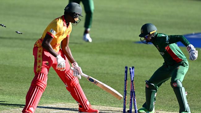 Nurul Hasan of Bangladesh stumps Richard Ngarava of Zimbabwe. Photo by Bradley Kanaris/Getty Images