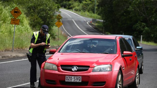 Queensland Police have set up a roadblock on Pine Creek Yarrabah Road, and are only allowing residents and essential services into the indigenous community to help slow the spread of coronavirus. PICTURE: BRENDAN RADKE