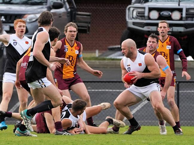 Stewart Crameri tries to weave his way through traffic earlier this season. Picture: Adam Cornell