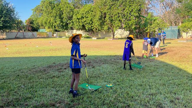 Students giving golf a crack in remote communities. Picture: Supplied.