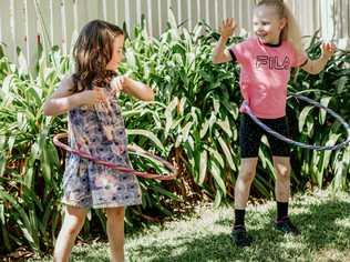 Grand Central is hosting a School Camp these school holidays. Amelie Fawcett and Audrey Thompson enjoying hula hooping outdoors thanks to Rebel.