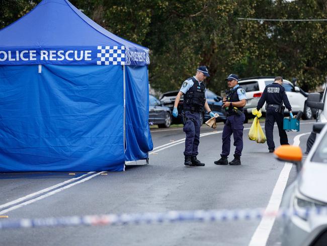 Police at the crime scene on Sunday. Picture: Max Mason-Hubers