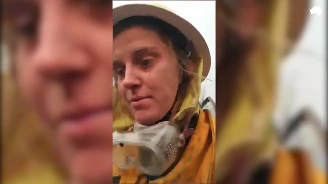 Siobhan Threlfall emerges from the Nerrigundah RFS shed after the firestorm has passed, to find most of the village destroyed, with only 5 houses left standing