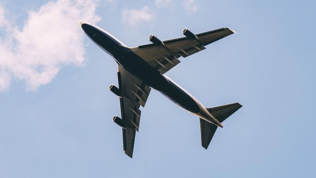 Aeroplane flying overhead.