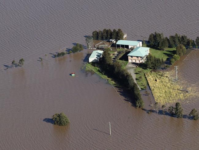 MAITLAND, AUSTRALIA - JULY 08:  Flooding is shown by helicopter on a tour of the Hunter Region by NSW Premier Dominic Perrottet and Emergency Services and Resilience and Minister for Flood Recovery Steph Cooke on July 08, 2022 around Maitland, Australia. Floodwaters have inundated the region following days of storms and heavy rains.  (Photo by David Swift-Pool/Getty Images)