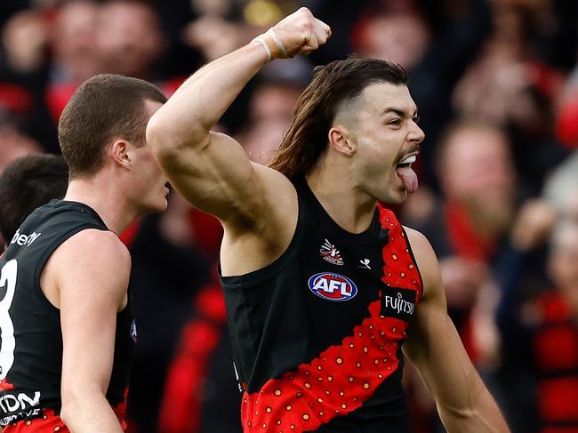 MELBOURNE, AUSTRALIA - APRIL 25: Nik Cox (left) and Sam Draper of the Bombers celebrate during the 2024 AFL Round 07 match between the Essendon Bombers and the Collingwood Magpies at the Melbourne Cricket Ground on April 25, 2024 in Melbourne, Australia. (Photo by Michael Willson/AFL Photos via Getty Images)