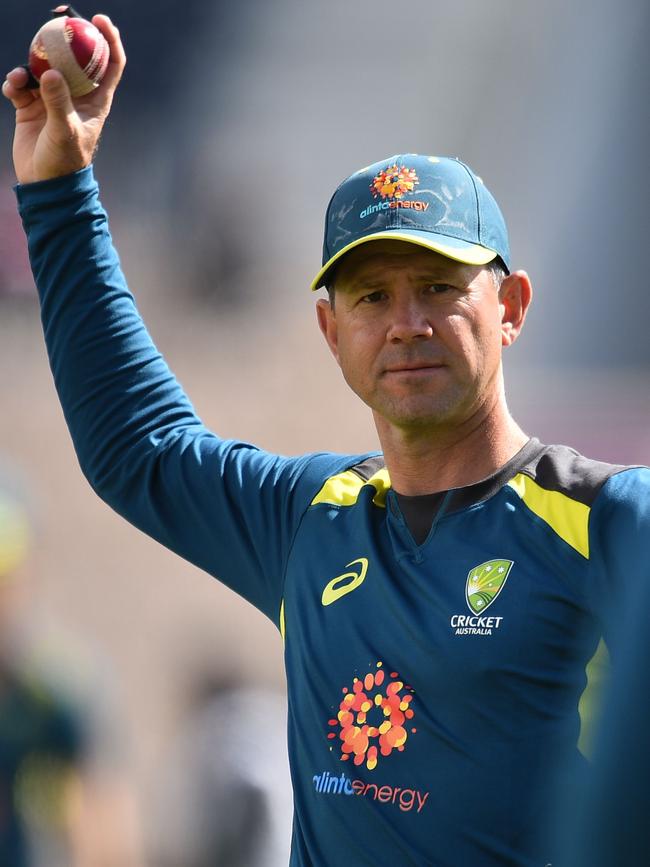 Assistant coach Ricky Ponting takes players through their paces during fielding practice. Picture: AFP