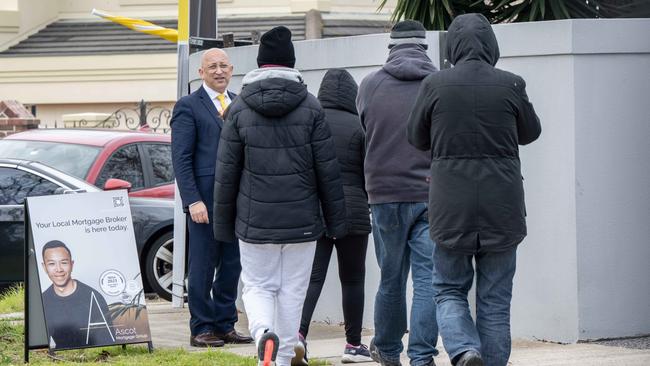 Buyers attend an Avondale Heights auction. Picture: Tony Gough.