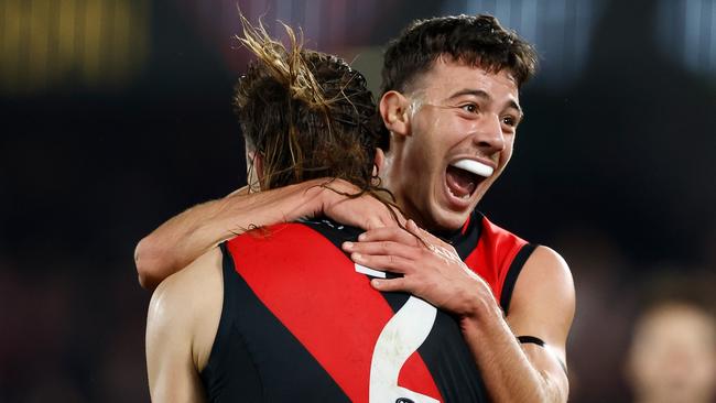 Sam Draper and Massimo D'Ambrosio of the Bombers celebrate. Picture: Michael Willson/AFL Photos via Getty Images