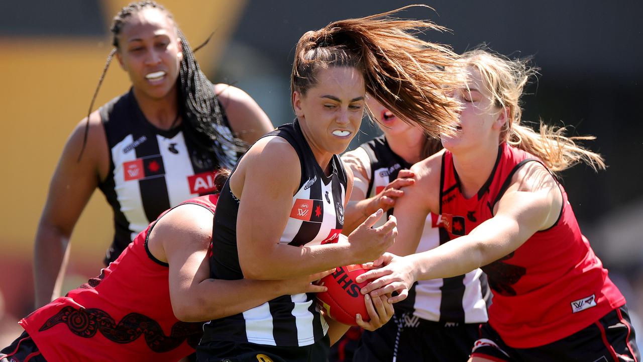 Aishling Sheridan is gang tackled. Picture: Kelly Defina/AFL Photos/via Getty Images