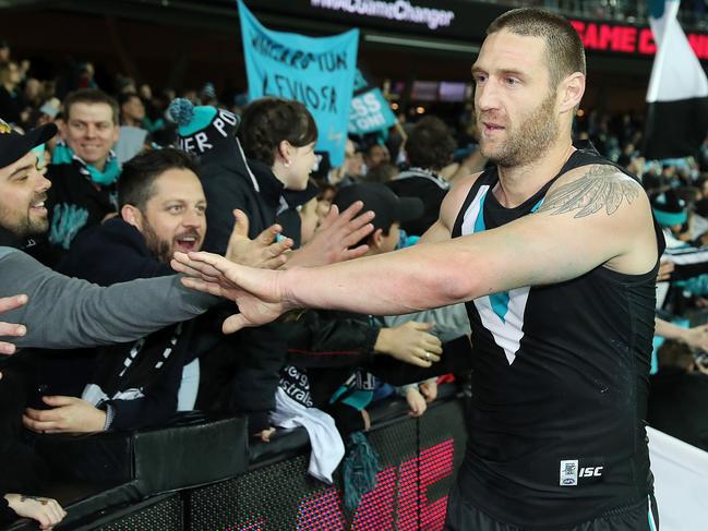 Jay Schulz celebrates a win during his time at Port Adelaide. Picture: Calum Robertson