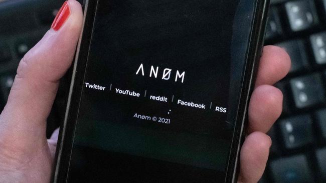 The ANoM app appears on the screen of a smartphone in Paris, on June 8, 2021. - Some 250 people were arrested in Sweden and Finland in the global sting on organised crime, authorities said on June 8, 2021, using phones planted by the US FBI, law enforcement officers were able to read the messages of global underworld figures in around 100 countries as they plotted drug deals, arms transfers and gangland hits on the compromised ANOM devices. (Photo by Olivier MORIN / AFP)