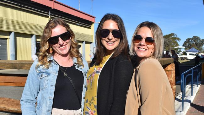 April, Chelsea and Lozz at the Roma Rugby Races at Bassett Park on Saturday June 24, 2023. Picture: Chloe Cufflin.