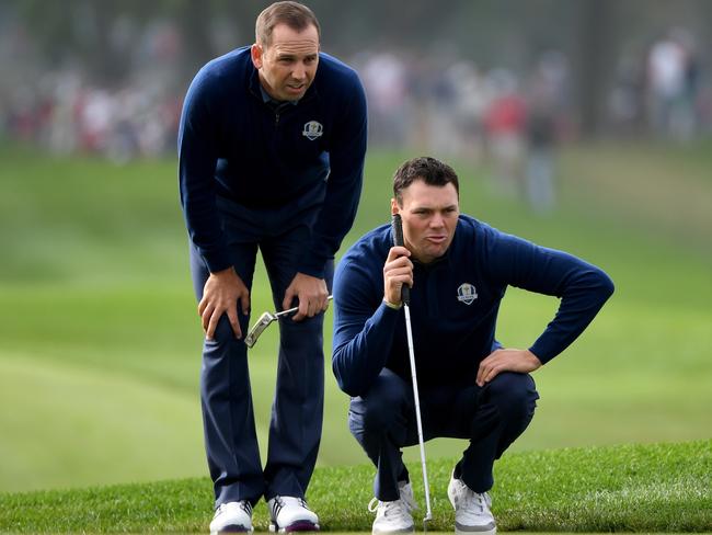 Sergio Garcia and Martin Kaymer of Europe line up a putt on the sixth green during morning foursome matches of the 2016 Ryder Cup. Picture: Getty