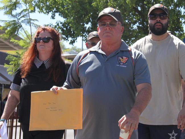 United Workers Union NT branch secretary Erina Early and unionised NT corrections officers descended on NT Treasurer Bill Yanâs office in Alice Springs on Friday, February 21 2025, with a letter demanding NT Corrections Commissioner Matthew Varley stand down. Picture: Gera Kazakov