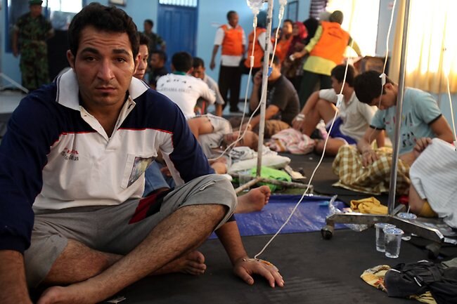 <p>Survivors of the Indonesian boat tragedy. Picture: Lukman Bintoro</p>