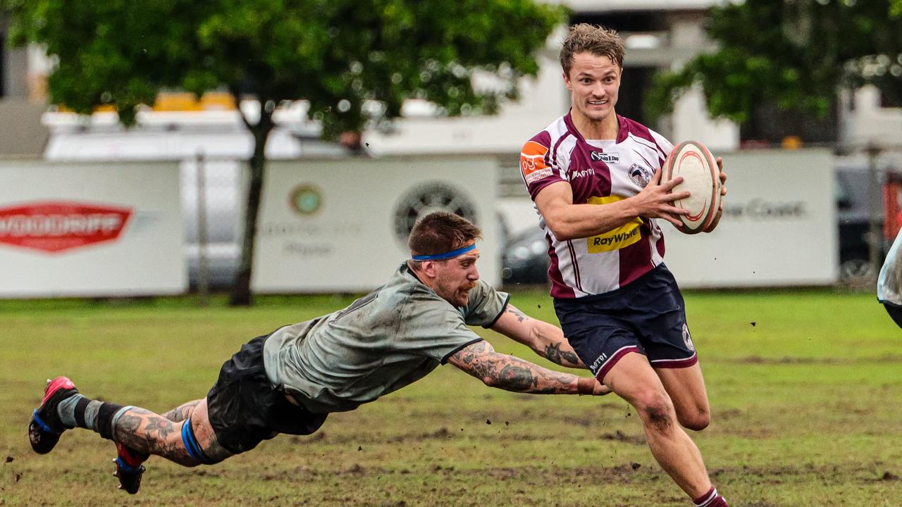 Jordan Mayhew in action for the Noosa Dolphins as he gets past a Maroochydore Swans player. Picture: Rachel Wright Images