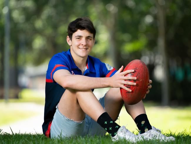 AAP Southern CourierAFL player Errol Gulden poses for a photo on the Village Green Barker St, Kingsford  on Sunday April 7 2019. UNSW Eastern Suburbs Bulldogs AFL player Errol Gulden is one of our nominees for Local Sports Stars. He is in the Sydney Swans AFL U18 academy.(AAP IMAGE / MONIQUE HARMER)