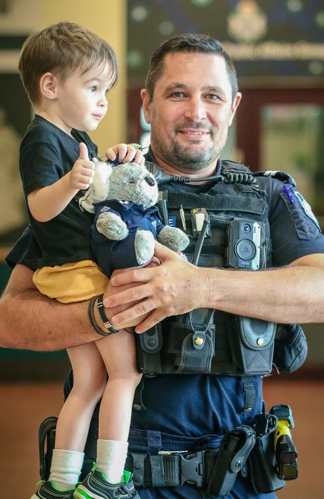 B Senior Constable Stewart Power with Ethan Hopper, 3. Picture: Glenn Campbell/NCA NewsWire