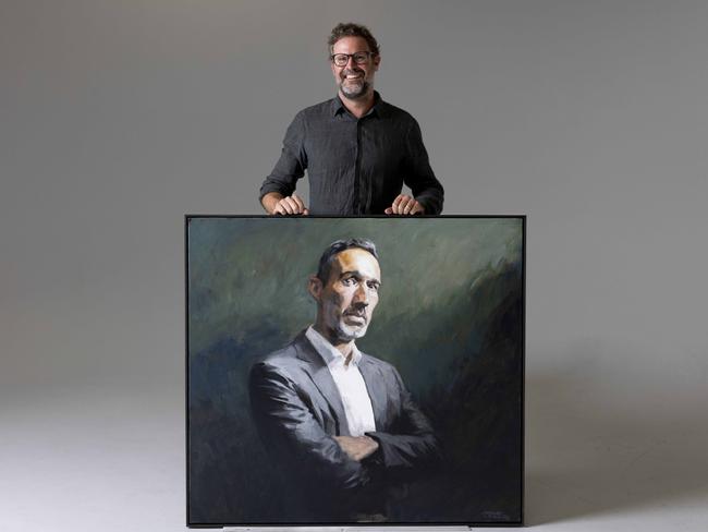 Johannes Leak with his Archibald entry painting of Alex Ryvchin. PIC: Ryan Osland