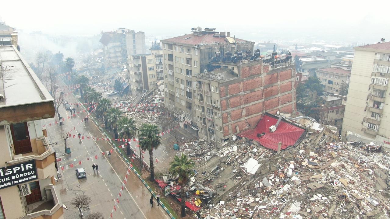 A general view shows damaged and collapsed buildings after an earthquake in Kahramanmaras, Turkey February 6, 2023. Ihlas News Agency (IHA) via REUTERS ATTENTION EDITORS - THIS PICTURE WAS PROVIDED BY A THIRD PARTY. NO RESALES. NO ARCHIVES. TURKEY OUT. NO COMMERCIAL OR EDITORIAL SALES IN TURKEY.