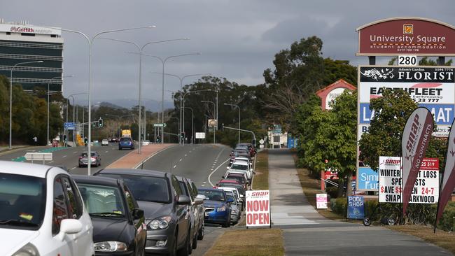 Vehicles parked on the side of Olsen Avenue near the Gold Coast University Hospital and Griffith University. Picture: Regi Varghese