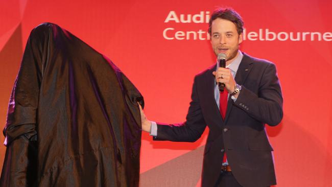 Hamish Blake unveils a new model of Andy Lee.