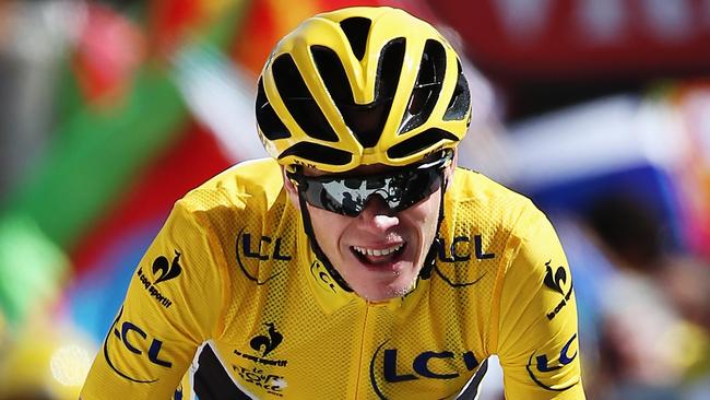 L'ALPE D'HUEZ, FRANCE - JULY 25: Chris Froome of Great Britain and Team Sky crosses the finish line at the end of the twentieth stage of the 2015 Tour de France, a 110.5 km stage between Modane Valfrejus and L'Alpe d'Huez on July 25, 2015 in L'Alpe d'Huez, France. (Photo by Doug Pensinger/Getty Images)