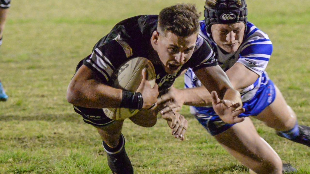 Trent Seeds dives over the line to score for Eastern Suburbs.