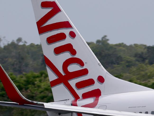 Aircraft at Cairns Airport, Virgin Australia Boeing 737-800 registration number VH-YFG. Photo: Marc McCormack