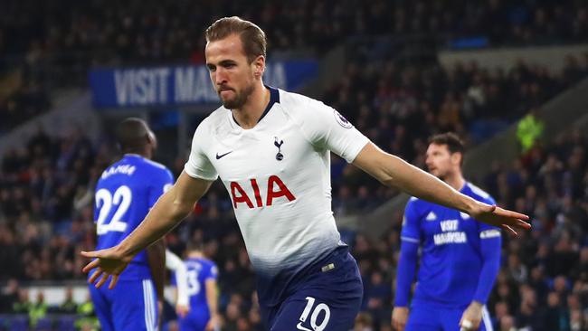 Harry Kane guided Tottenham to victory over Cardiff.