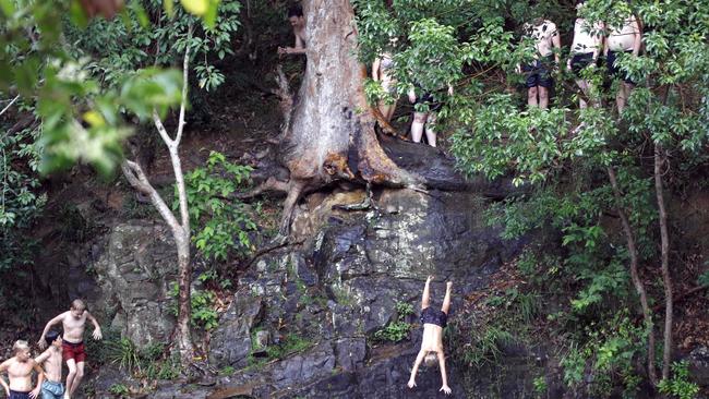 Kids were seen jumping off the rocks at Currumbin Rock Pools. Picture: Tertius Pickard