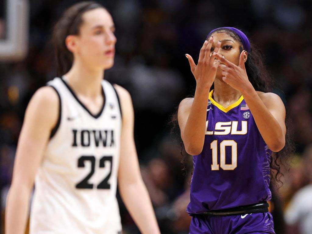 Angel Reese is seen pointing towards her ring finger. Picture: Maddie Meyer/Getty Images via AFP