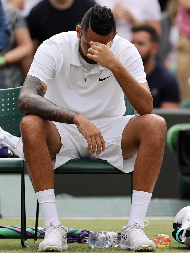 Nick Kyrgios retired injured during his third round match at Wimbledon. Picture: Getty