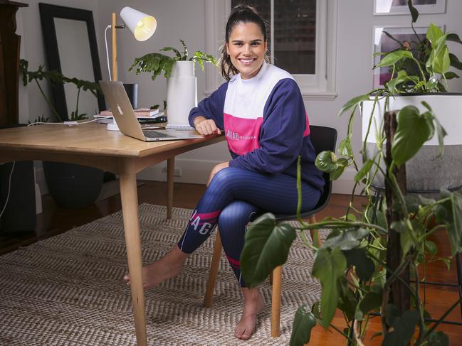 PR coorindator Liv Jacobs, wearing activewear, while working from home during the coronavirus outbreak. Picture: Wayne Taylor