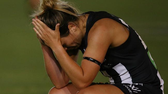 Sophie Casey holds her head in her hands after knocking out Meg Downie. Picture: Wayne Ludbey