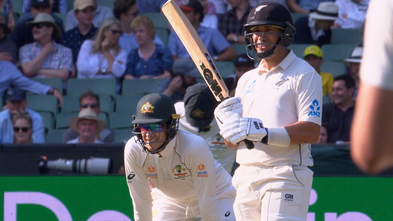 Tim Paine exchanged words with Ross Taylor over his successful lbw review.