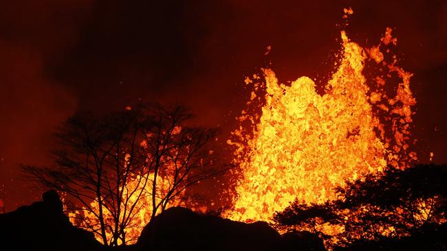 Lava erupts inside Leilani Estates near Pahoa, Hawaii. (Jamm Aquino/Honolulu Star-Advertiser via AP)