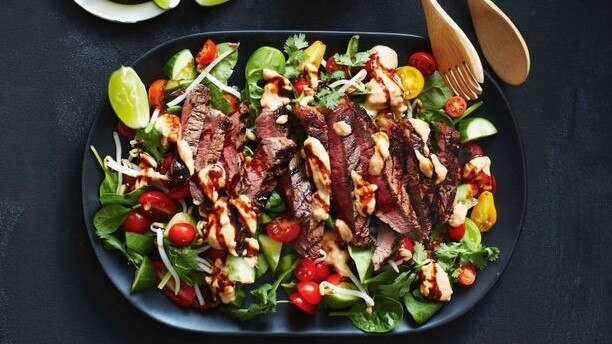 Beef steak with satay sauce and sprout salad. Picture: Chris L Jones and Guy Bailey