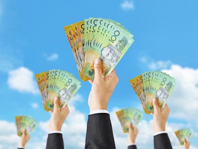 Hands holding money - Australian dollar (AUD) bills - money raising, funding & consumerism concept. equity crowdfunding - australian money for business ideas