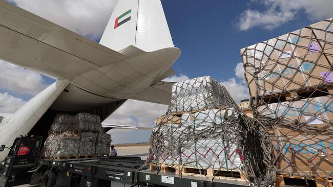 Aid from an Emirates cargo plane is unloaded at Egypt's el-Arish airport on Thursday. Picture: AFP