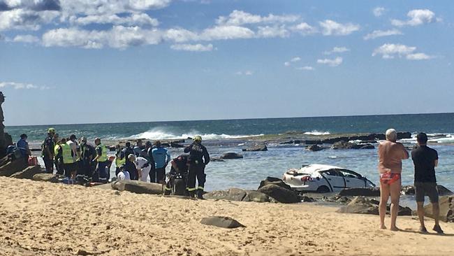 A car has gone over the cliff at Bar Beach Picture: Peter Lorimer