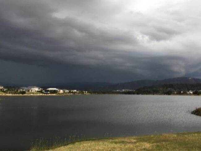 A severe thunderstorm lashed the Gold Coast and northern New South Wales this afternoon and into the evening. While the rain and hail sent most people diving and running for cover, some budding photographers snapped away at the dark cloud formations. This photo was taken by Em Crooks