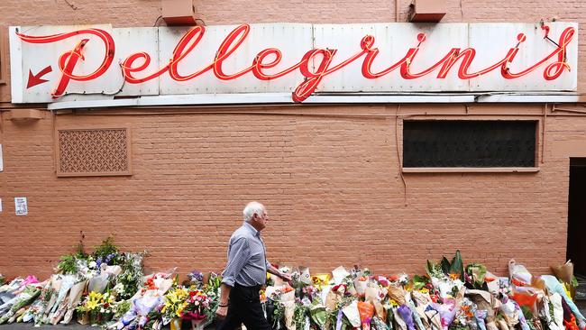 Floral tributes rest outside Pellegrini’s cafe in Bourke St after co-owner Sisto Malaspina was killed by Hassan Khalif Ali in this month’s terror attack in Melbourne.