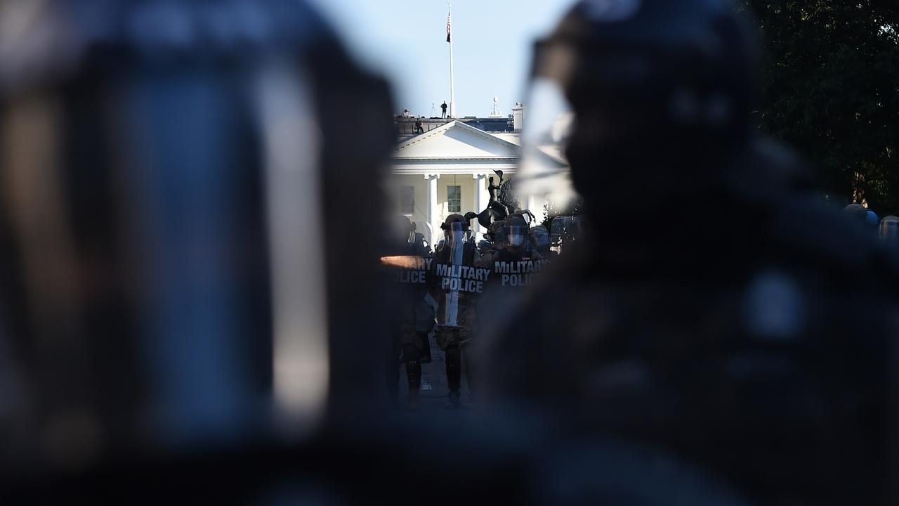 Military police members hold a perimeter near the White House. Picture: Olivier DOULIERY / AFP.